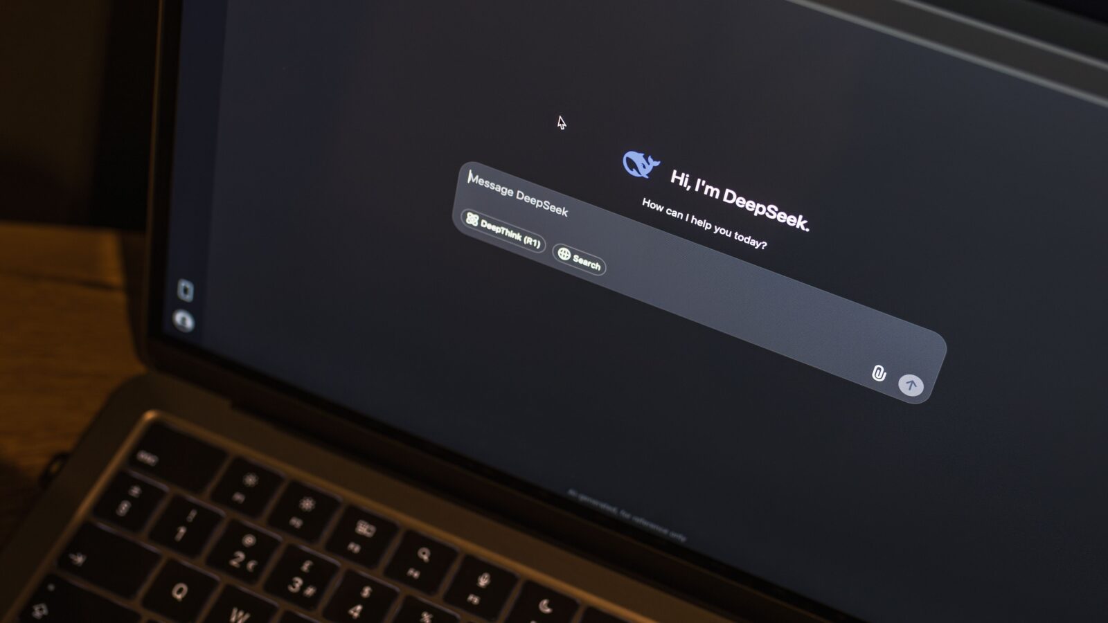 Laptop computer at night displaying an AI chat interface, representing the technology behind Discord translation connections