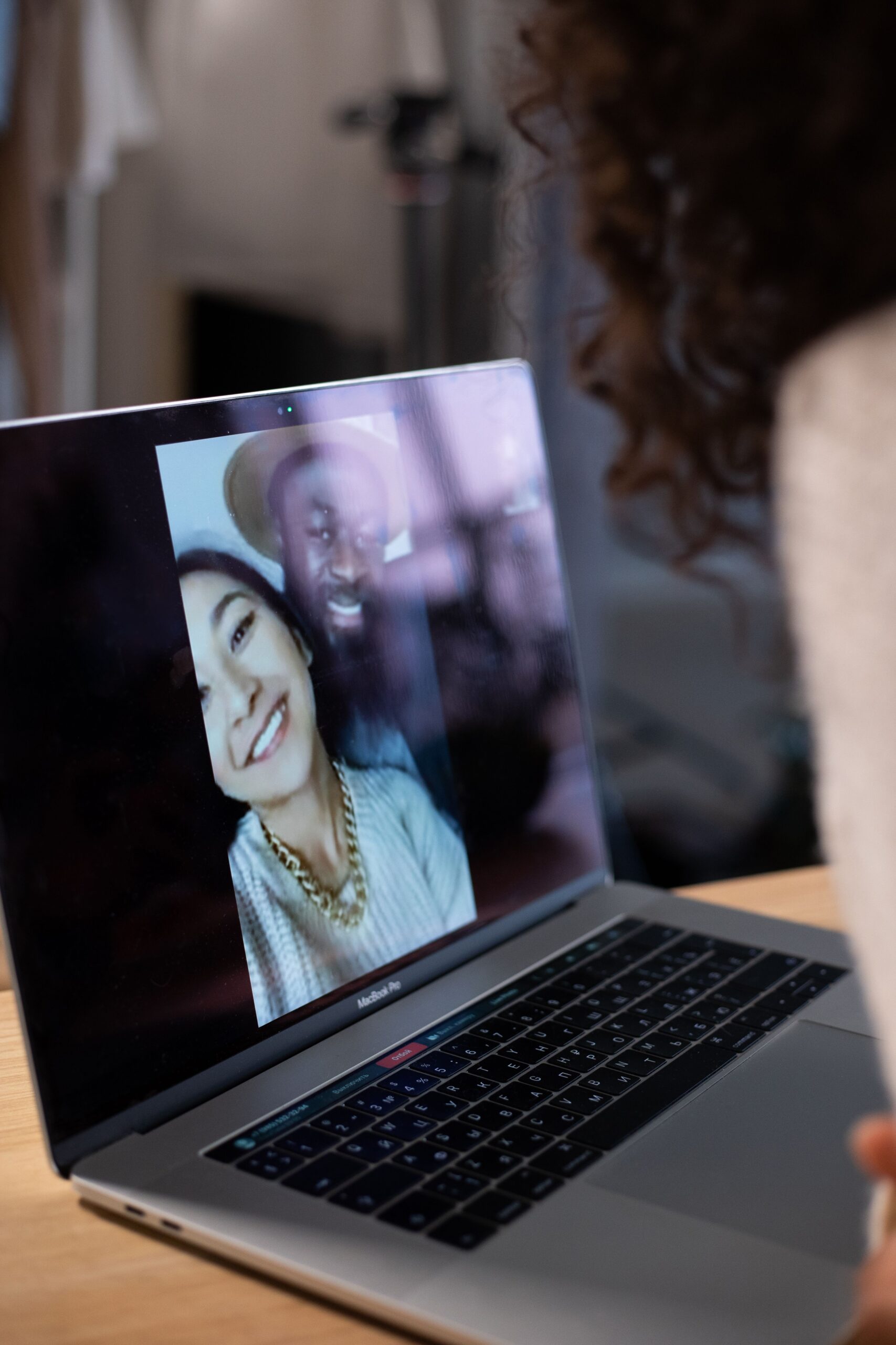 Credit: gabby-k, Pexels License, via Pexels Person on a video call on a laptop, the kind of mixed-language conversation a translation bot keeps readable