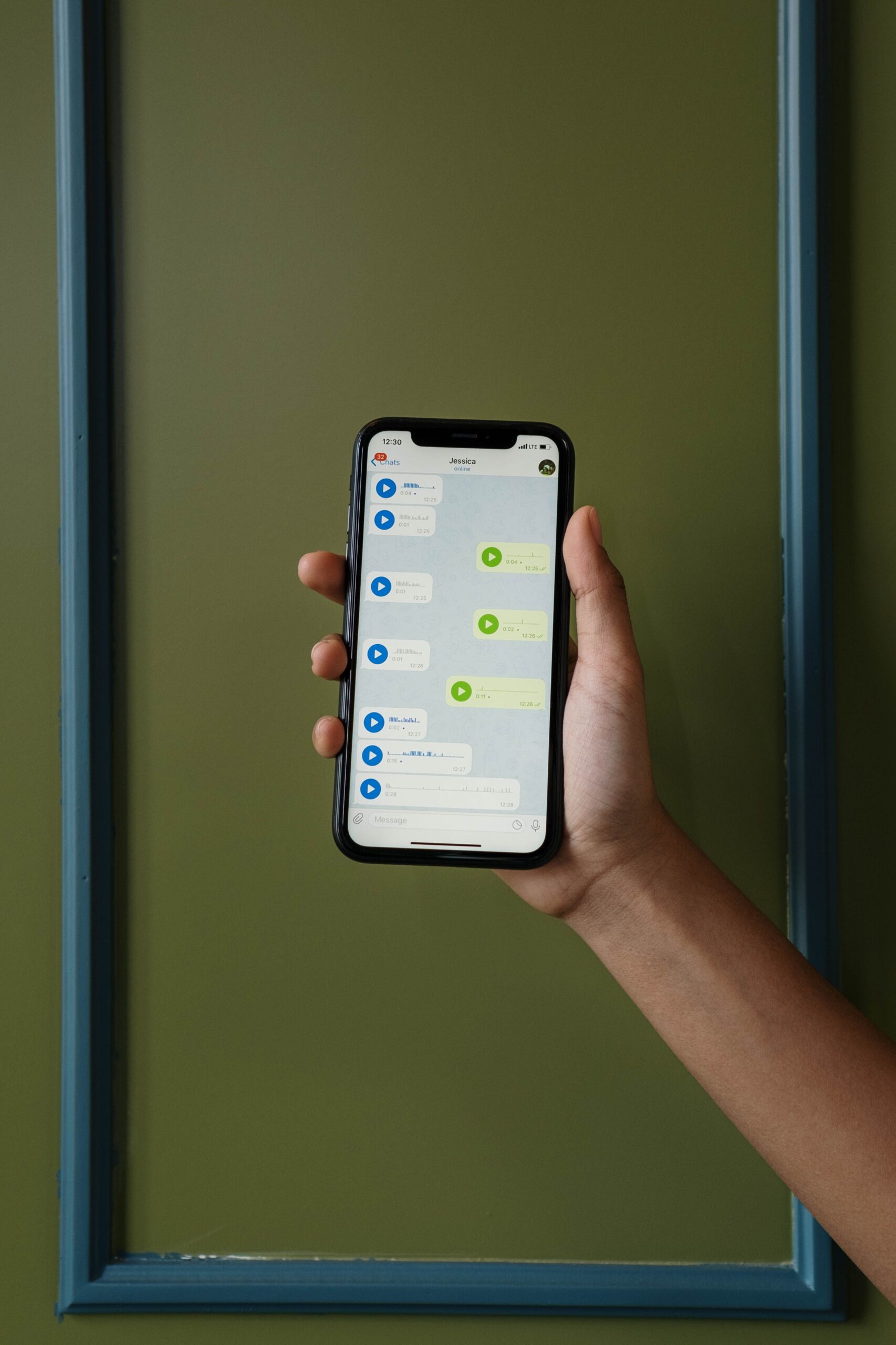 Credit: Cottonbro Studio, Pexels License, via Pexels a smartphone showing a chat thread with outgoing voice message bubbles