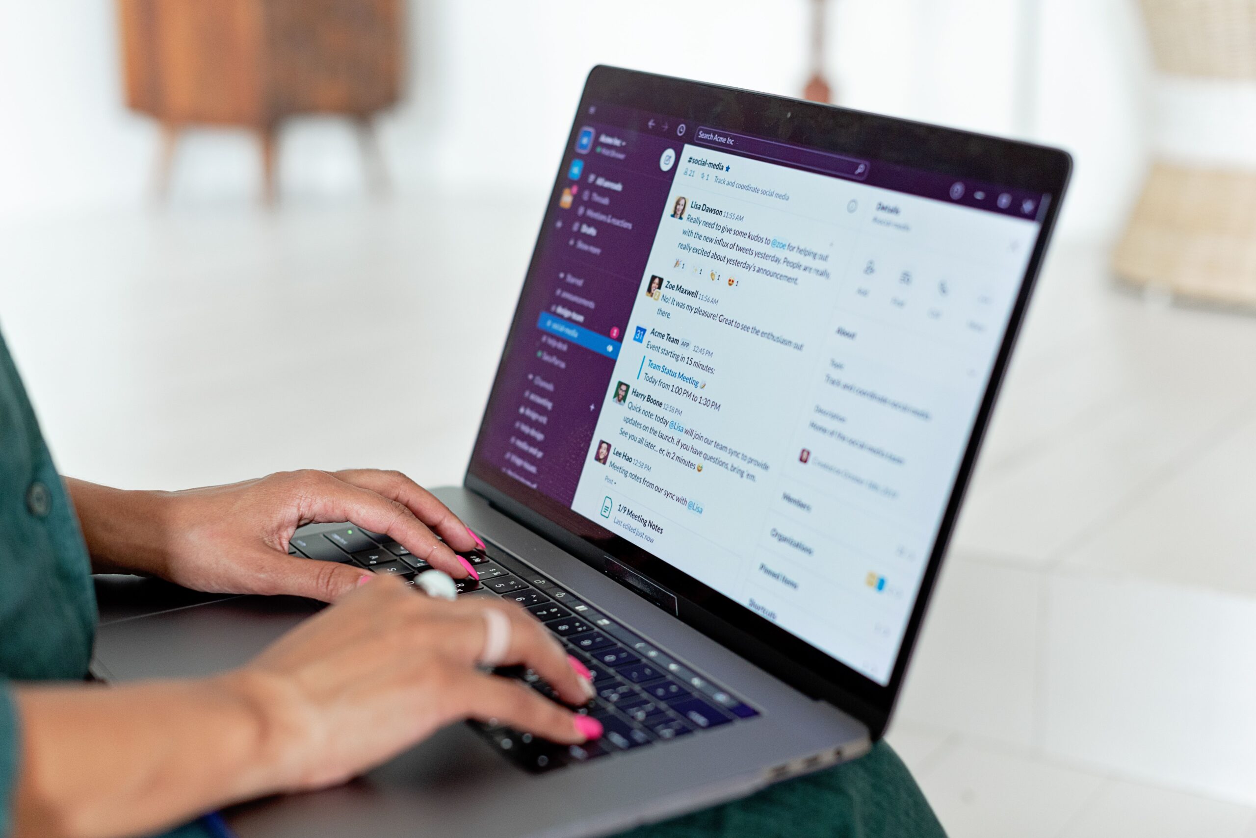 Credit: Mikhail-Nilov, Pexels License, via Pexels Hands typing on a laptop with a chat window open on the screen